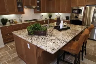 The luxury designed dining table with Granite Counter Tops in kitchen at Littleton, CO