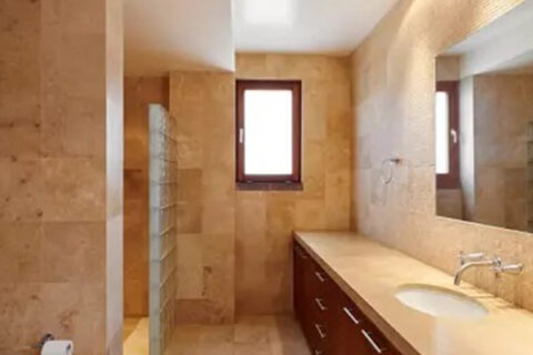 The bathroom with Brown marble stones at Littleton, CO