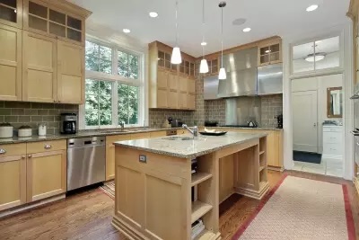 The Kitchen with finished with wooden and granite countertop at Littleton, CO