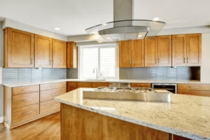 Brown color wooden and granite kitchen countertop