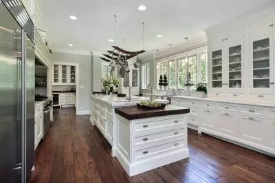 Modular kitchen with white theme and furniture's at Littleton, CO