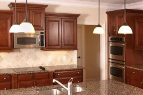 Kitchen with dark brown granite