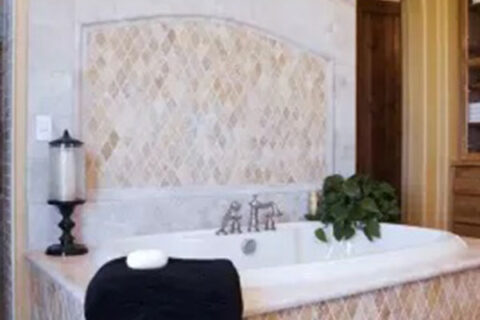 Bathroom tub with pink granite