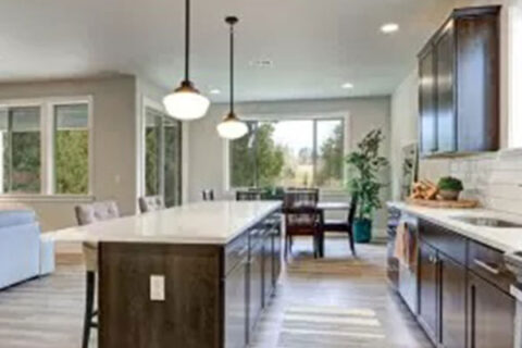 Kitchen with Wooden flooring and white granite