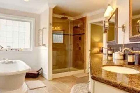 The Luxurious Bathroom with golden granite at Littleton, CO