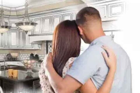 Couple having a feel of modern Kitchen