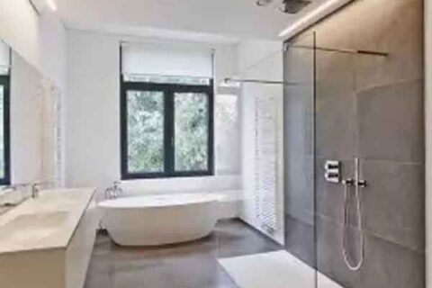 The Luxurious Bathroom with white marble stones at Littleton, CO