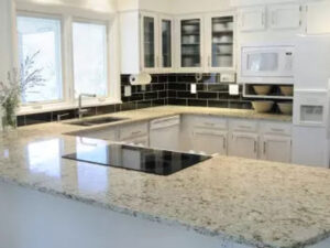 The kitchen finished with white color granite countertop at Littleton, CO