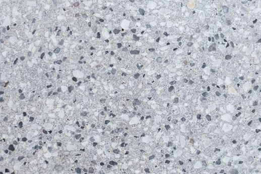 A close-up of a white and black speckled surface