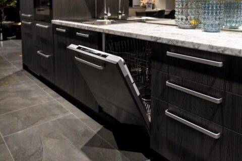 A dishwasher open in a kitchen