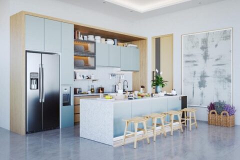 Minimalist kitchen with light blue cabinets, granite island, stainless steel appliances, and wooden stools in Durango, CO